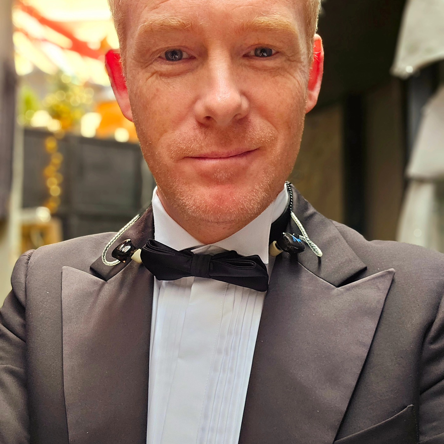 The Suited Singer in smoking
